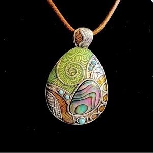 Lia Sophia pendant necklace w/abalone shell on brown suede string. EUC.